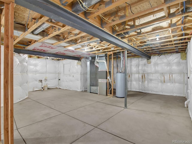 basement featuring heating unit and water heater