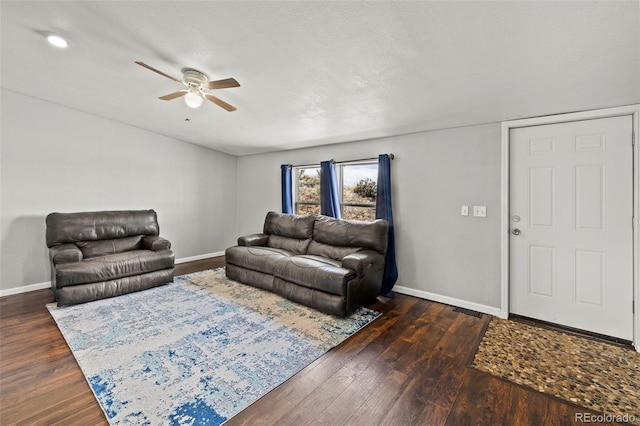 9765LAPINTURAPT La Pintura Pt, Fountain, CO 80817 - living area featuring ceiling fan, baseboards, and dark wood-style floors