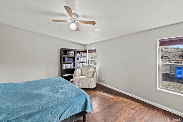 9765LAPINTURAPT La Pintura Pt, Fountain, CO 80817 - bedroom with wood finished floors, baseboards, ceiling fan, a textured ceiling, and vaulted ceiling