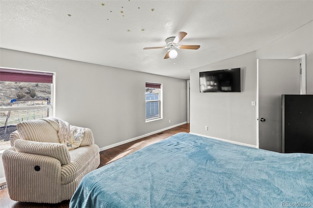 9765LAPINTURAPT La Pintura Pt, Fountain, CO 80817 - bedroom featuring baseboards, wood finished floors, and ceiling fan