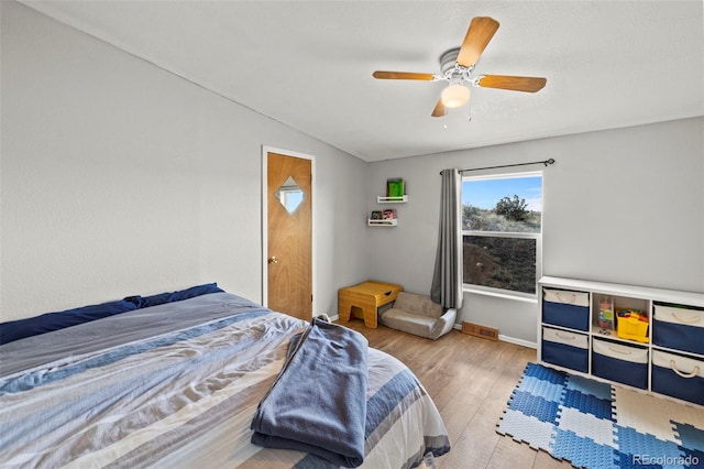9765LAPINTURAPT La Pintura Pt, Fountain, CO 80817 - bedroom with wood finished floors, lofted ceiling, baseboards, and ceiling fan