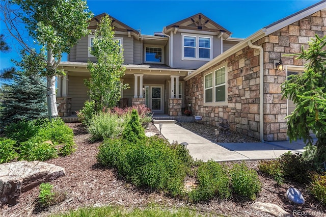 craftsman-style home featuring covered porch