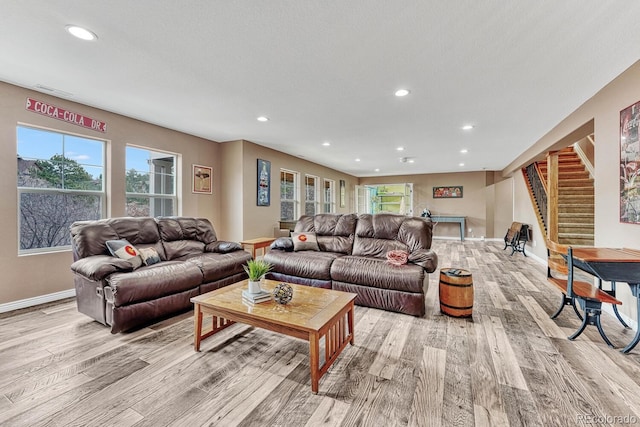 living room with light hardwood / wood-style floors