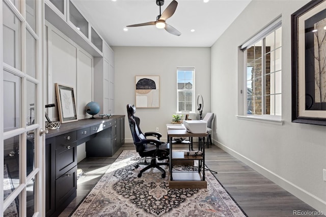 office featuring dark wood-type flooring and ceiling fan