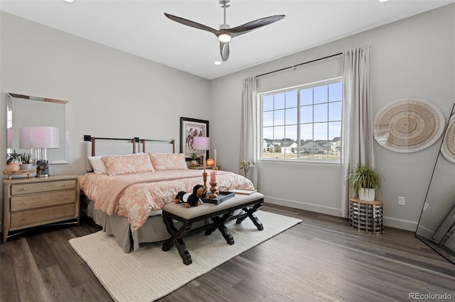 bedroom featuring ceiling fan and dark wood-type flooring