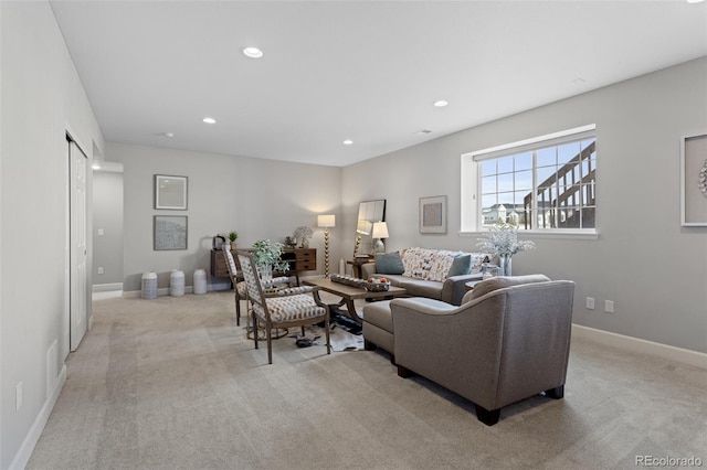 living room with light colored carpet