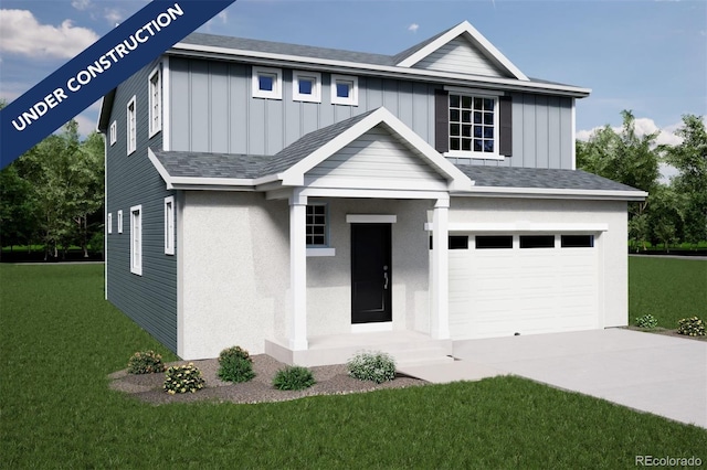 view of front of house featuring a front yard and a garage