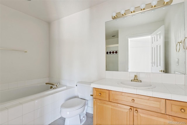 bathroom featuring a garden tub, tile patterned flooring, a tile shower, vanity, and toilet