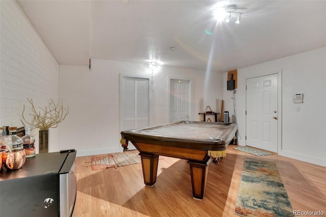recreation room with baseboards, billiards, and light wood-style flooring