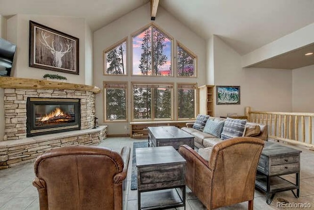 tiled living area with a fireplace, high vaulted ceiling, and beam ceiling