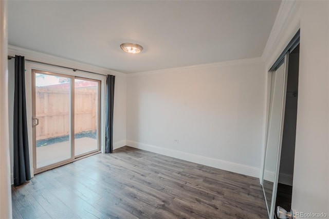 558 N Washington St Unit 103, Denver, CO 80203 - empty room with ornamental molding and wood finished floors