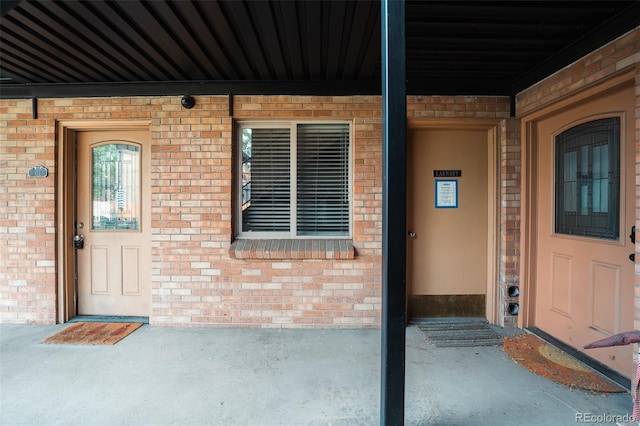 558 N Washington St Unit 103, Denver, CO 80203 - entrance to property featuring a porch and brick siding
