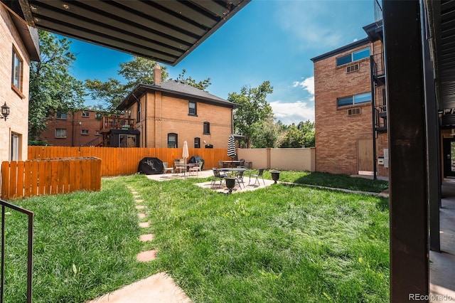 558 N Washington St Unit 103, Denver, CO 80203 - fenced backyard featuring a patio