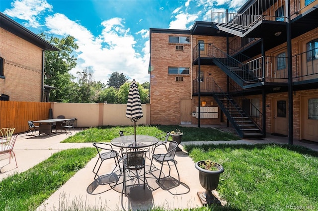 558 N Washington St Unit 103, Denver, CO 80203 - view of patio with stairs and outdoor dining area