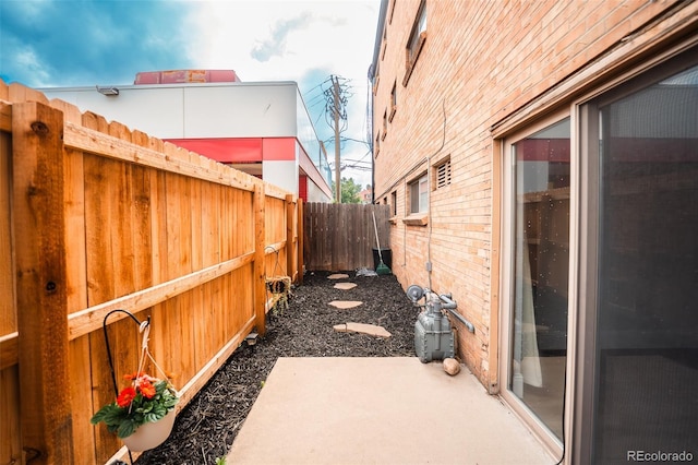 558 N Washington St Unit 103, Denver, CO 80203 - fenced backyard featuring a patio
