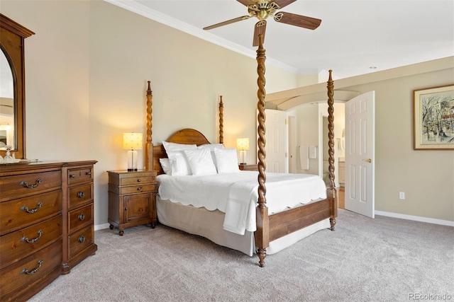 5120 Langdale Way, Colorado Springs, CO 80906 - bedroom with ornamental molding, light carpet, arched walkways, and ceiling fan