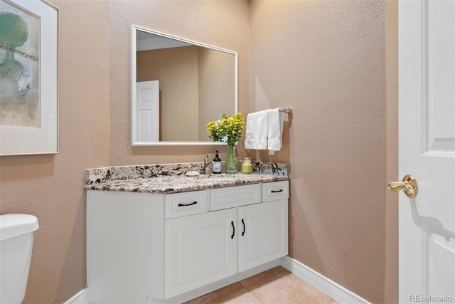 5120 Langdale Way, Colorado Springs, CO 80906 - half bath with vanity and tile patterned floors