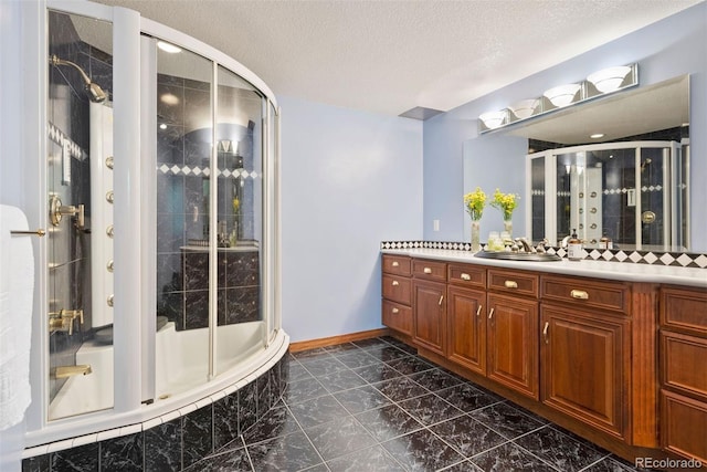5120 Langdale Way, Colorado Springs, CO 80906 - full bathroom featuring a tile shower, vanity, tile patterned flooring, and tiled tub