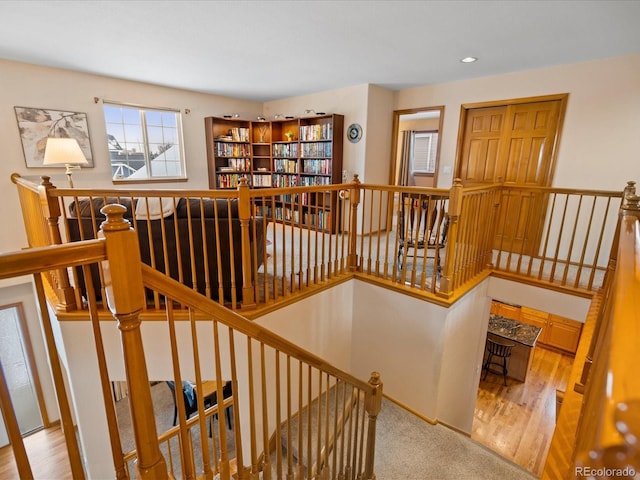 stairway with carpet flooring