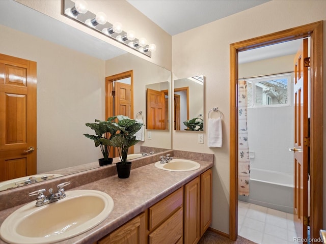 bathroom featuring vanity and shower / bath combo with shower curtain