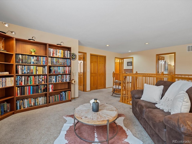 living room featuring light colored carpet