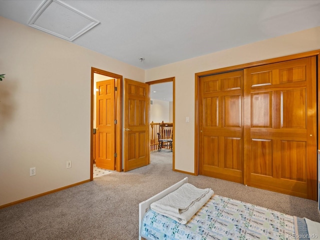 carpeted bedroom featuring a closet