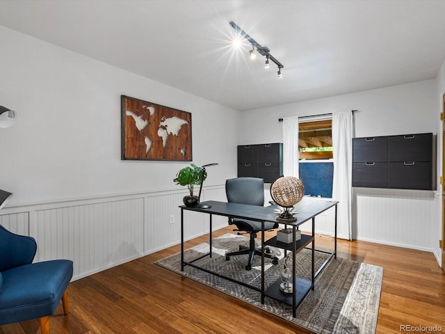 5884 S Hanover Way, Greenwood Village, CO 80111 - office area with wood finished floors, wainscoting, and track lighting