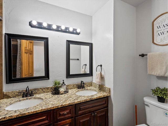5884 S Hanover Way, Greenwood Village, CO 80111 - full bathroom with double vanity and toilet