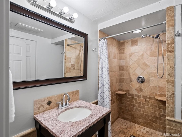 5884 S Hanover Way, Greenwood Village, CO 80111 - full bath with a tile shower and vanity