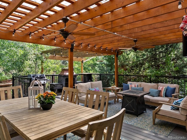 5884 S Hanover Way, Greenwood Village, CO 80111 - wooden terrace with an outdoor living space with a fire pit, a pergola, ceiling fan, and outdoor dining space