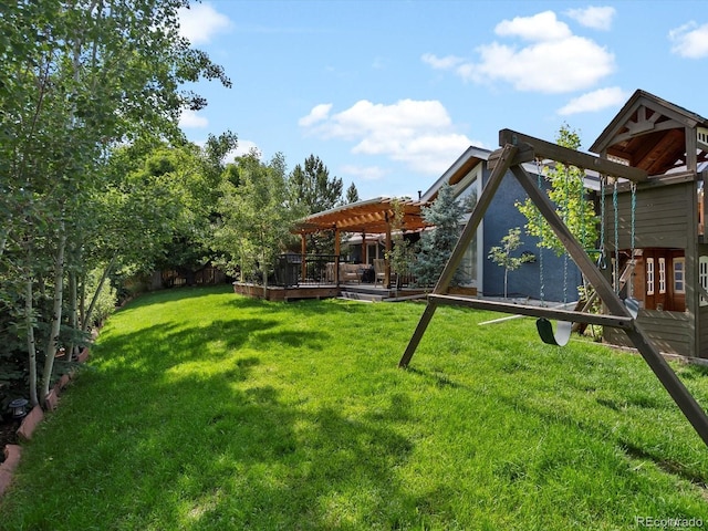 5884 S Hanover Way, Greenwood Village, CO 80111 - view of grassy yard featuring a pergola and a deck