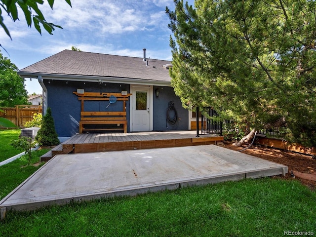 5884 S Hanover Way, Greenwood Village, CO 80111 - rear view of property with a deck, stucco siding, a shingled roof, and central AC unit