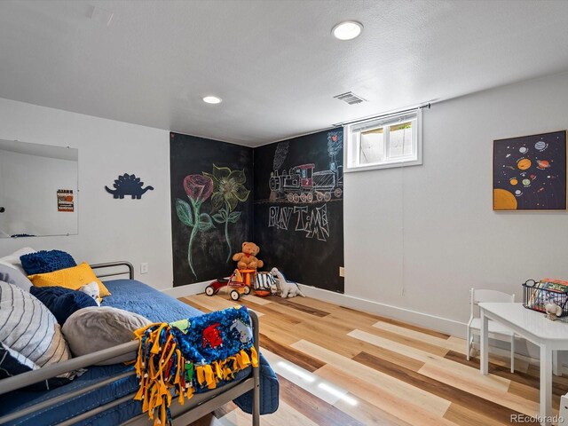 5884 S Hanover Way, Greenwood Village, CO 80111 - bedroom featuring wood finished floors, recessed lighting, and baseboards