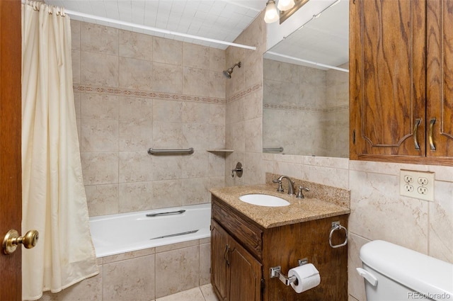 26063 Morris Ave, Conifer, CO 80433 - bathroom featuring tile walls, tiled shower / bath, toilet, and vanity