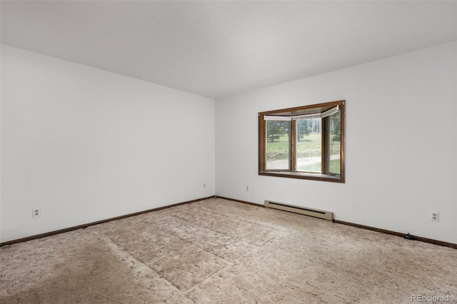 26063 Morris Ave, Conifer, CO 80433 - unfurnished room featuring baseboard heating, carpet floors, and baseboards