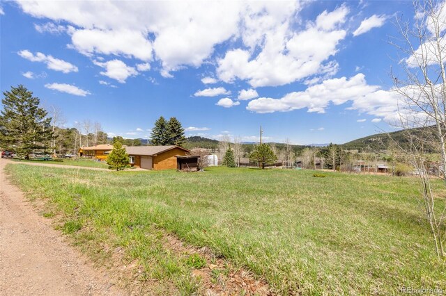 26063 Morris Ave, Conifer, CO 80433 - view of yard featuring a mountain view