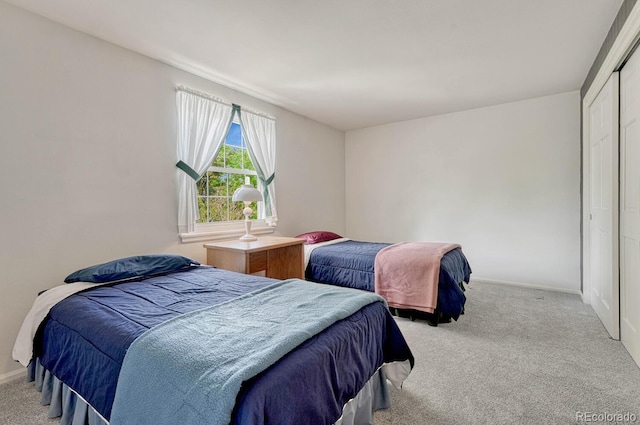7100 S Hudson Cir, Centennial, CO 80122 - bedroom featuring baseboards, carpet flooring, and a closet