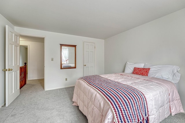 7100 S Hudson Cir, Centennial, CO 80122 - carpeted bedroom featuring baseboards