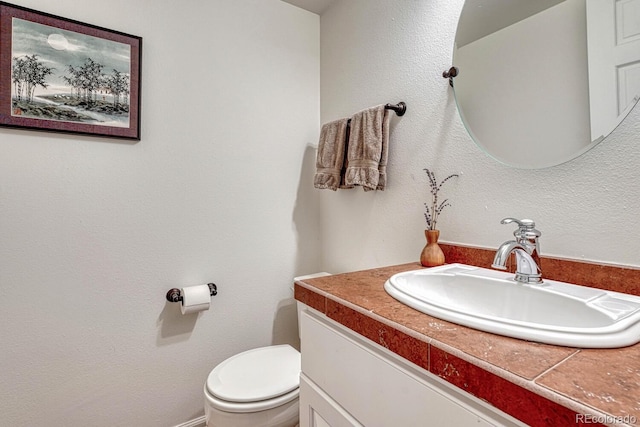 7100 S Hudson Cir, Centennial, CO 80122 - half bath with vanity and toilet