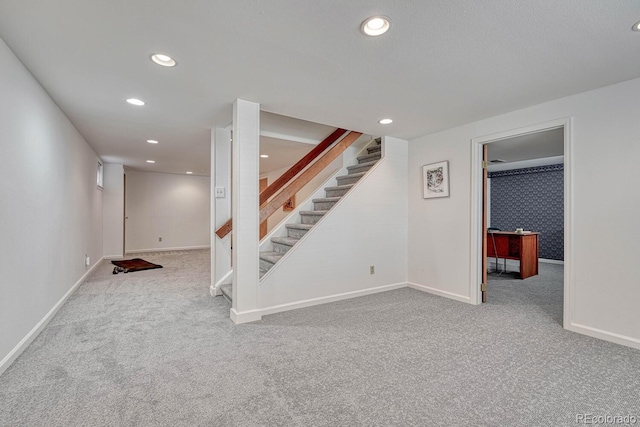 7100 S Hudson Cir, Centennial, CO 80122 - finished below grade area featuring recessed lighting, baseboards, carpet flooring, and stairs