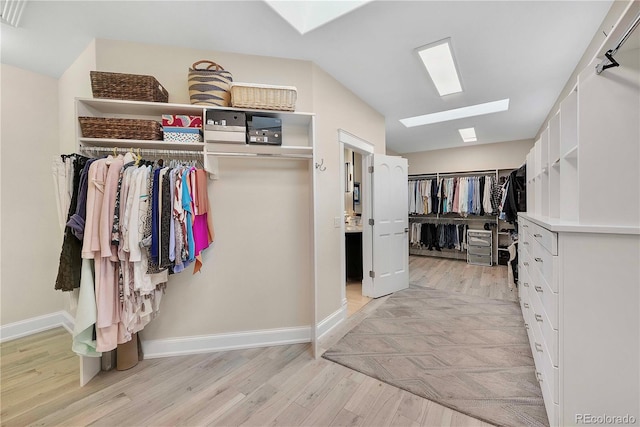 814 Neville Ln, Golden, CO 80401 - spacious closet with a skylight and light wood finished floors