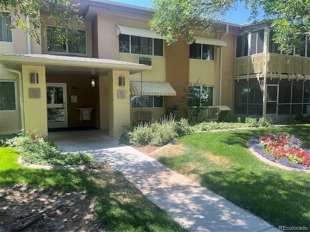 exterior space featuring a lawn