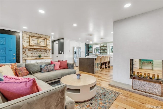 living room featuring light hardwood / wood-style floors