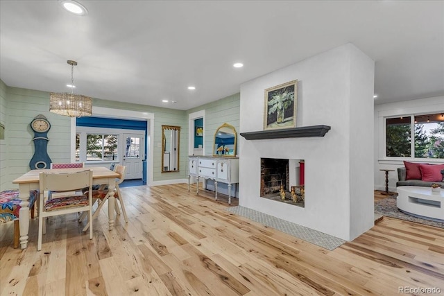 interior space with a chandelier and light wood-type flooring