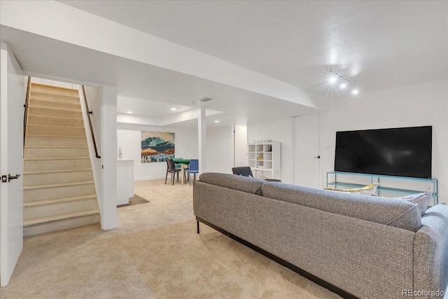 living room featuring light colored carpet