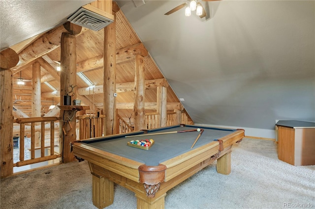game room with lofted ceiling, carpet flooring, visible vents, and ceiling fan