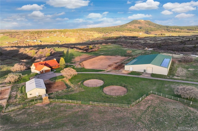 aerial view featuring a rural view and a mountain view