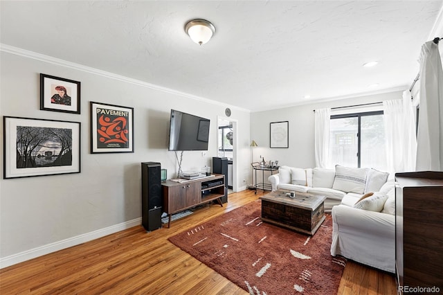 1240 Ulster St, Denver, CO 80220 - living area with healthy amount of natural light, ornamental molding, and wood finished floors