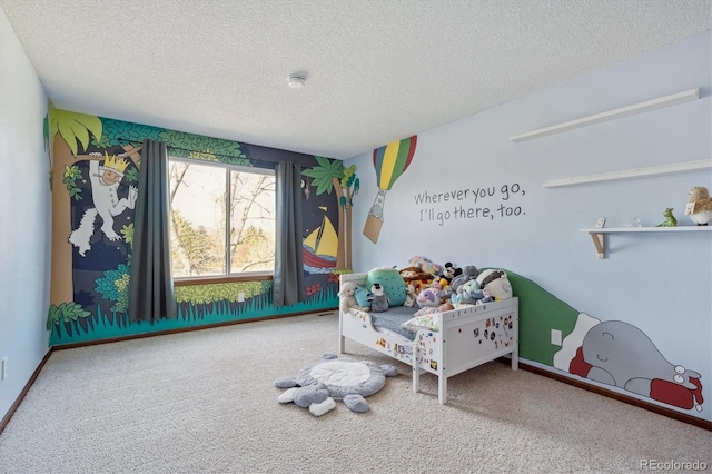 carpeted bedroom featuring a textured ceiling and baseboards