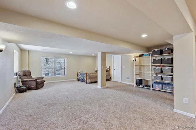 unfurnished room with visible vents, recessed lighting, baseboards, and carpet floors